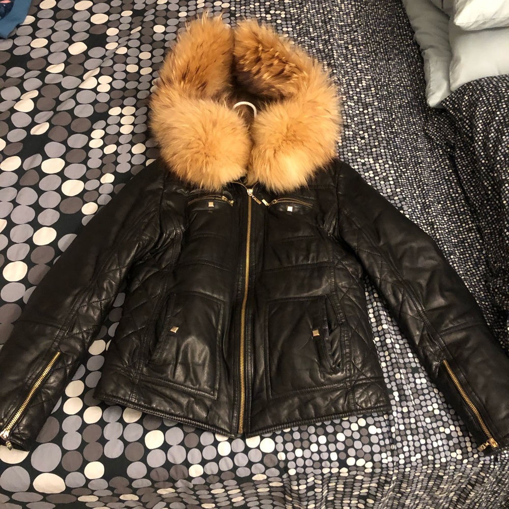 Leather jacket with arctic fox